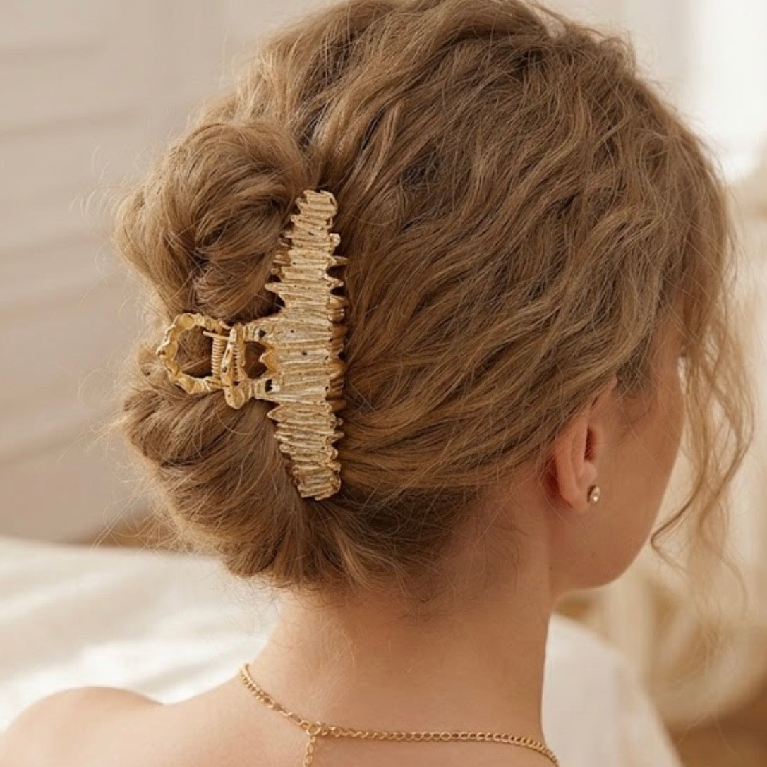 Pinza para el cabello dorada