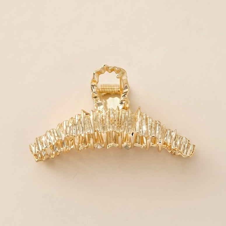 Pinza para el cabello dorada